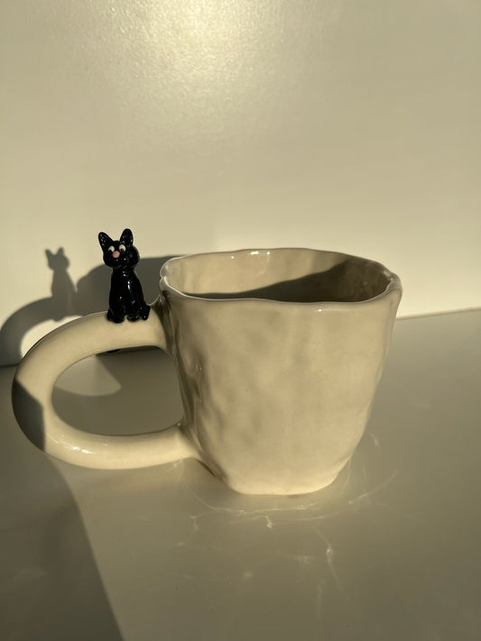 Pinched - Black Cat