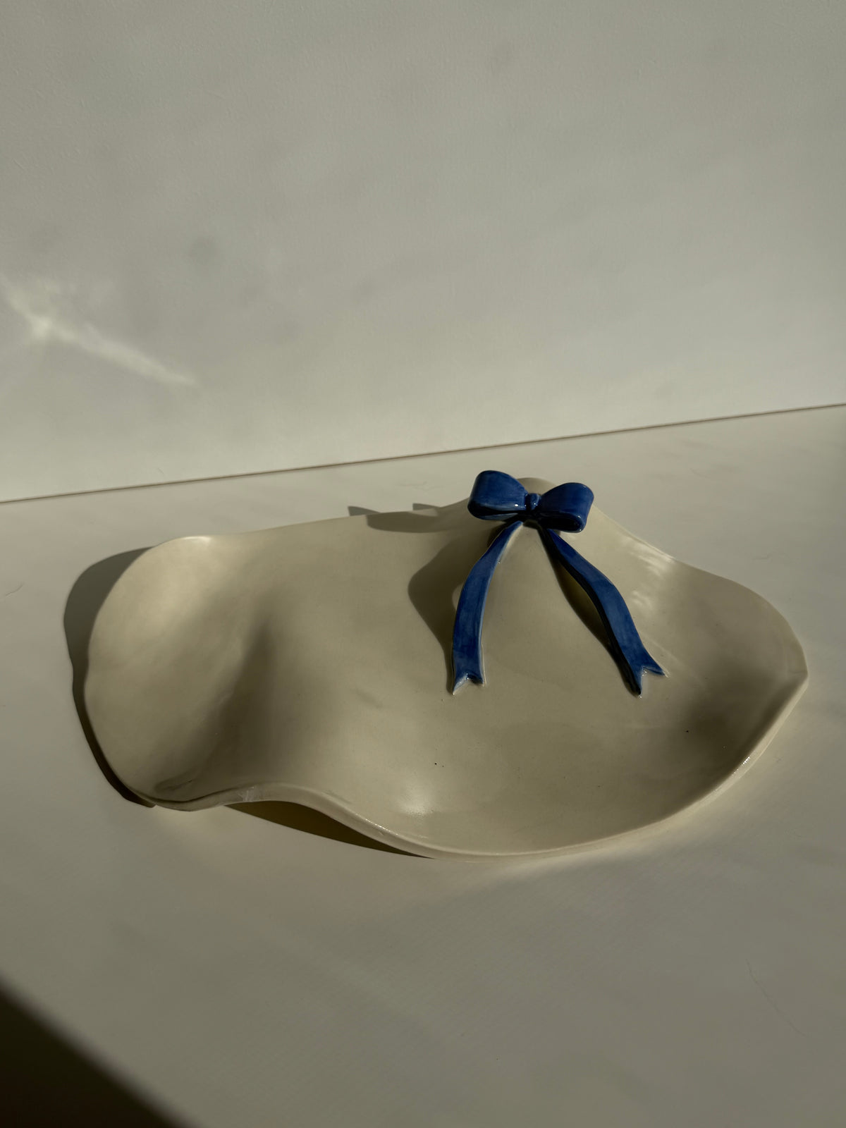 Wave Plate - Blue Bow