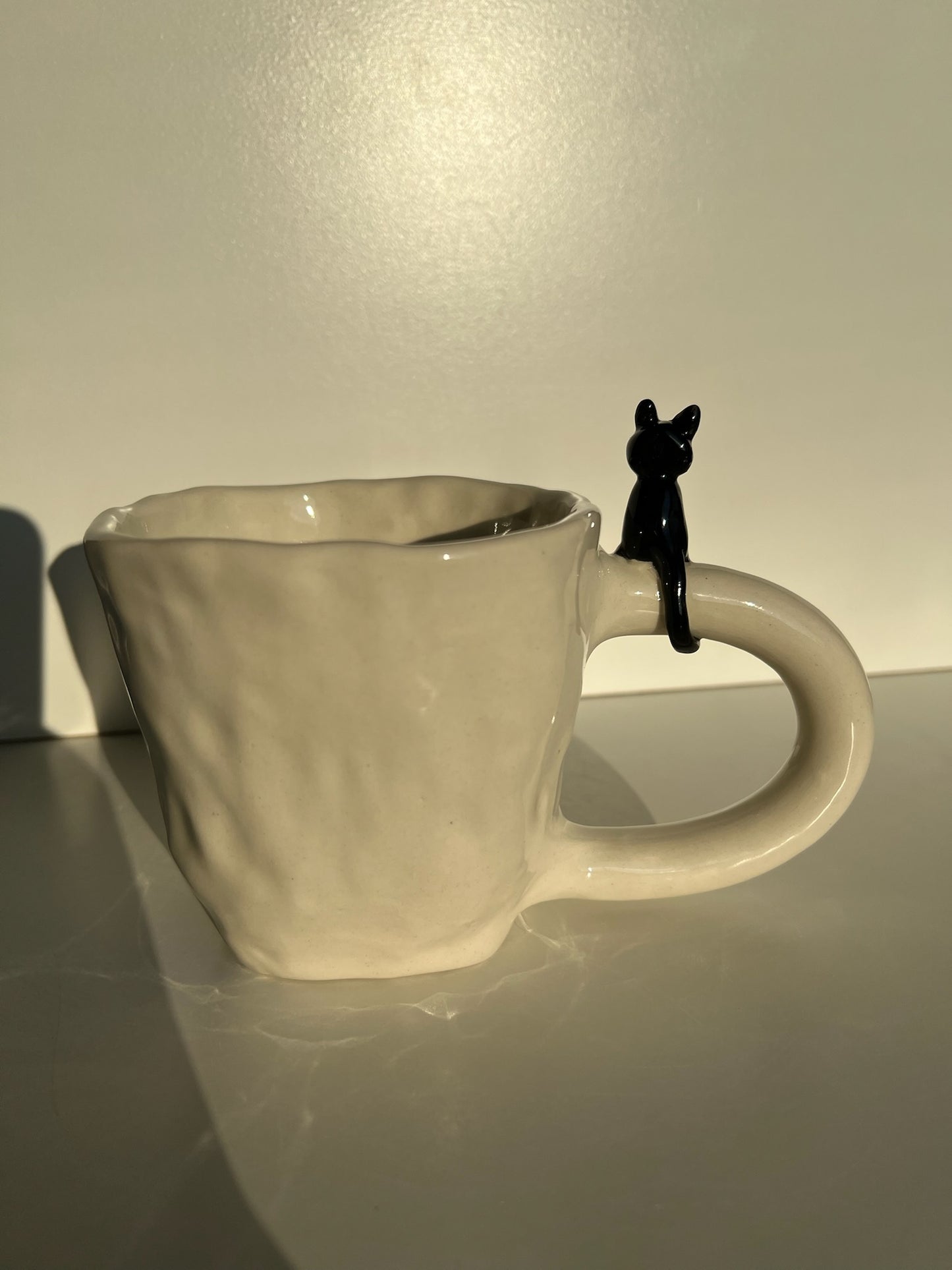 Pinched - Black Cat